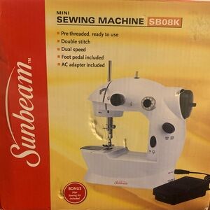 Sunbeam mini sewing machine.